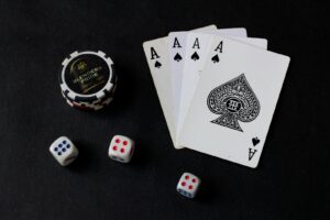 Professional poker player calculating bankroll strategy at a casino table