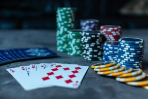 poker rules explained on a table with cards and chips