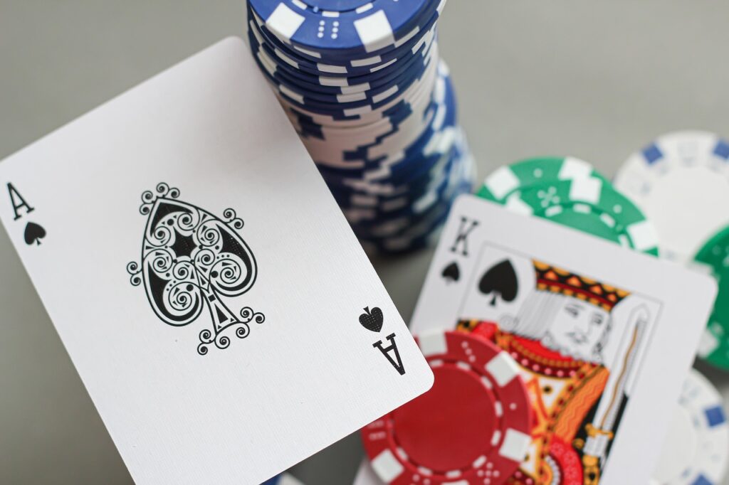 Poker Blinds Rules Poker chips placed in small and big blind positions at a live poker table
