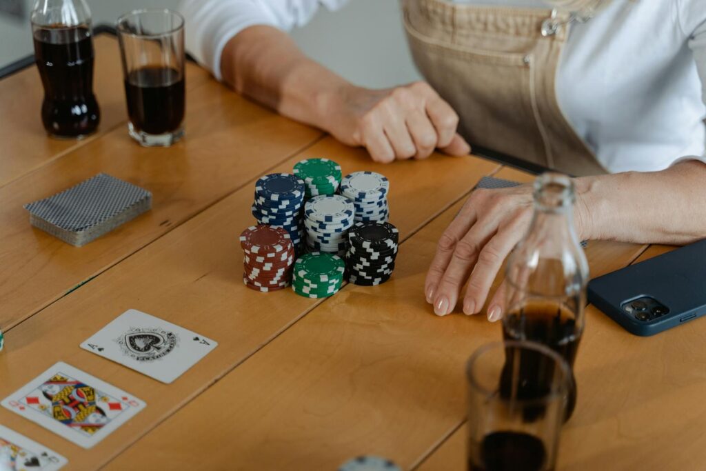 Straddle Rules in Poker Player using a straddle bet in a live poker game to boost the pot