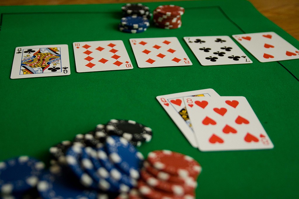 Poker Tips Poker player concentrating at the table, representing strategic poker gameplay