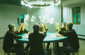 Players practicing advanced poker tips at a tournament table